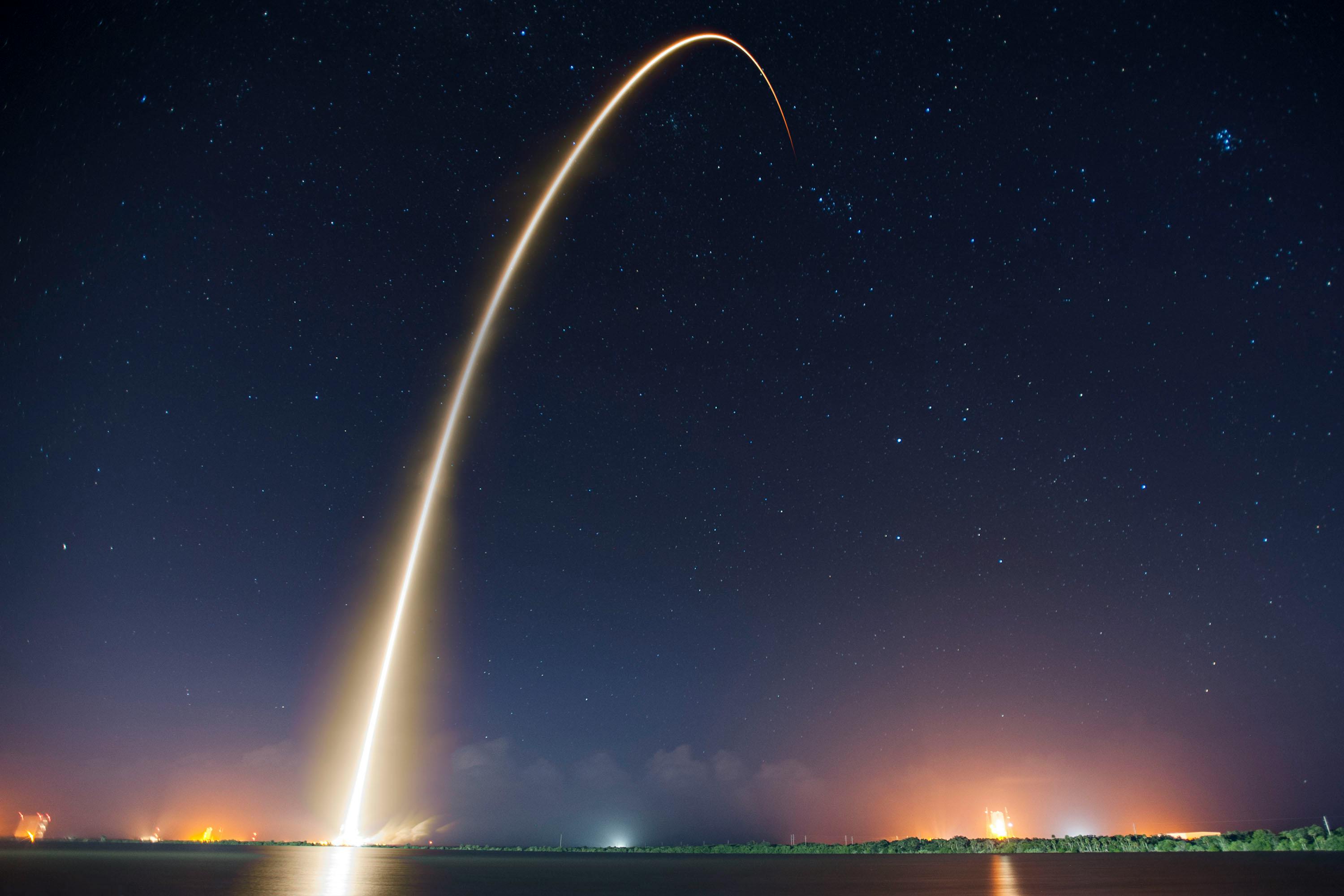 A rocket shooting across the night sky, looking for Slothrop's weiner.